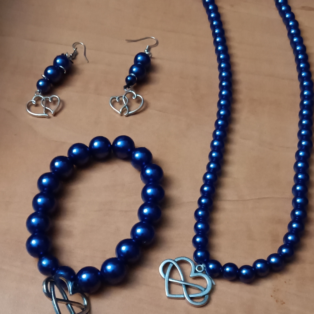 Royal__purple earrings,necklace, and bracelets   3 piece set( one size fits all)